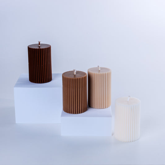 Short ribbed pillar candle
