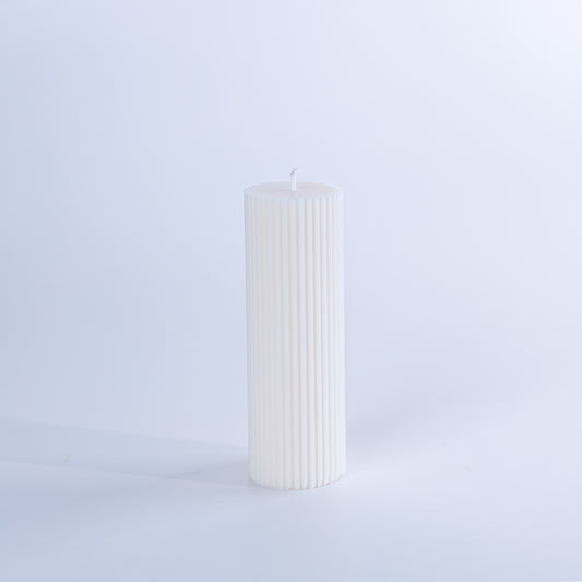Tall ribbed pillar candle